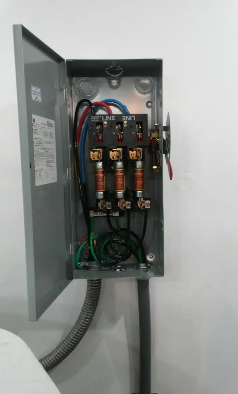 Three-phase disconnect switch installed for Smoke Detector Installation in Edinburg